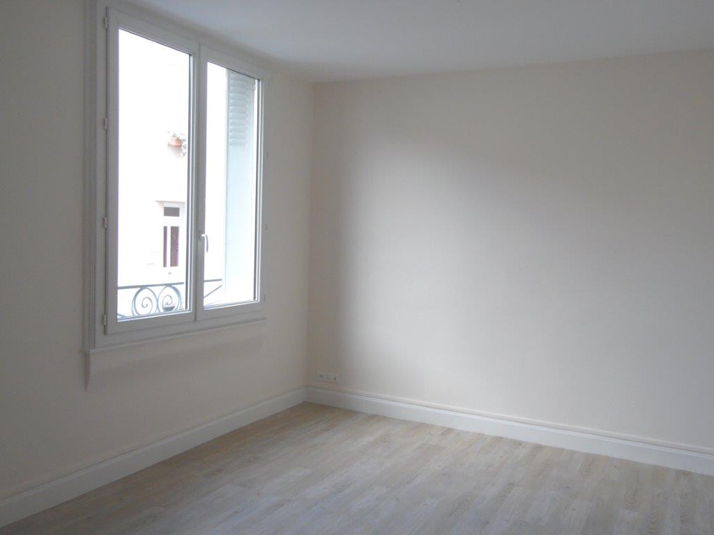 APPARTEMENT AVEC JARDINET PRIVATIF - Image 4
